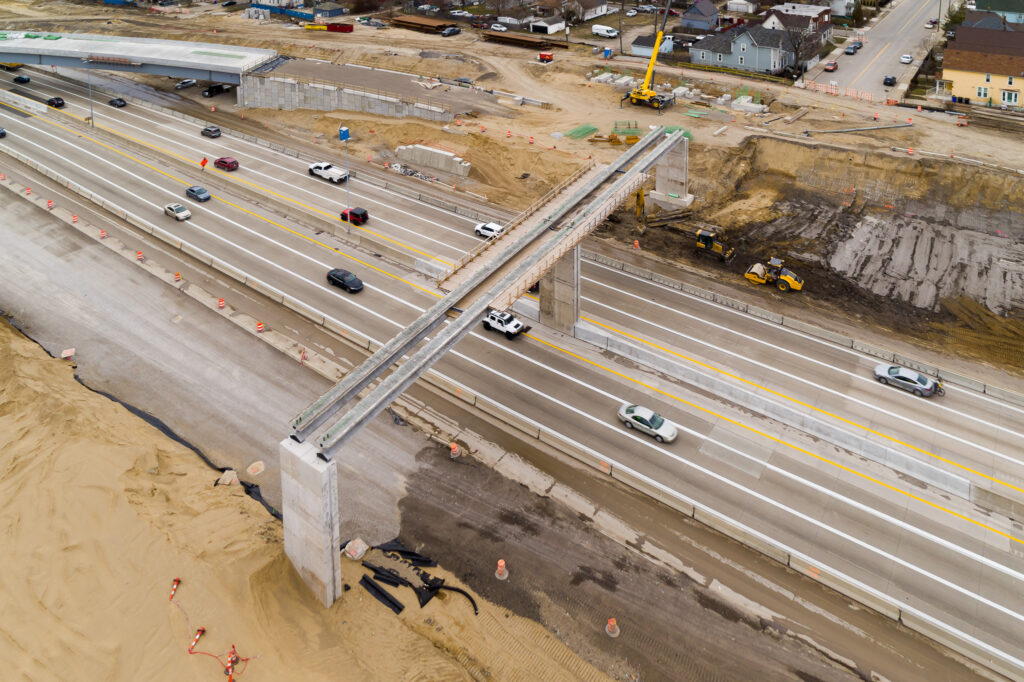 over bridge construction progress with traffic