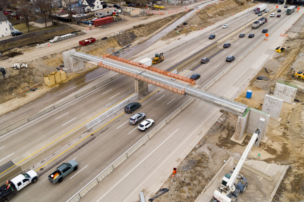 over bridge construction progress with traffic