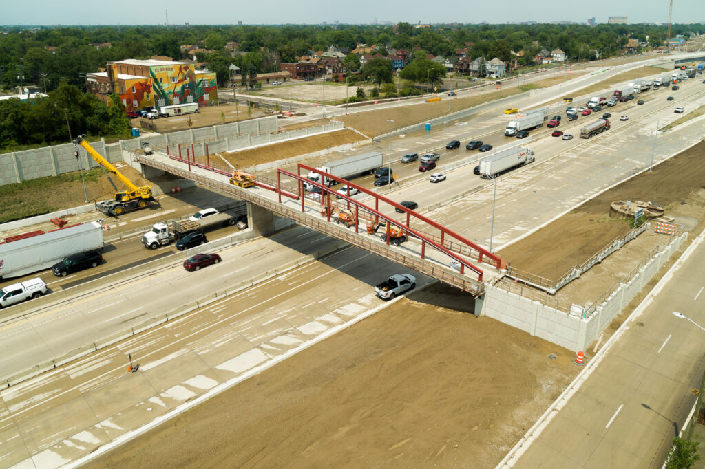 over bridge construction progress with traffic