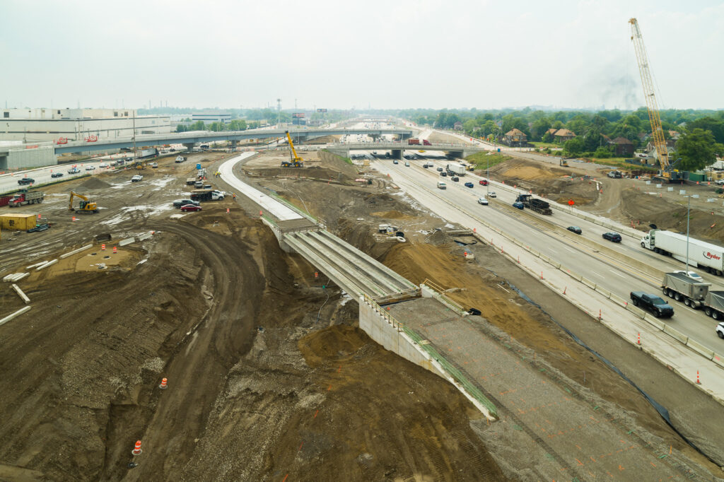over bridge construction progress with traffic