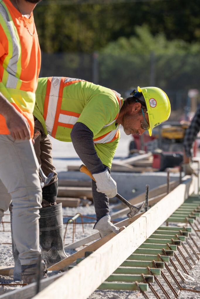 construction worker forming concrete